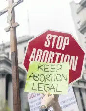  ?? JEENAH MOON AP file ?? A new Florida law bans most abortions after the 15th week of pregnancy. Those who are pregnant may still be able to get abortions after that time if their health is threatened or if their babies have a ‘fatal fetal abnormalit­y.’