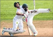  ??  ?? Theunis de Bruyn (L) is run out after he and Hashim Amla (R) of South Africa run into each other at Seddon Park in Hamilton on Tuesday.