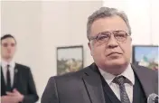  ?? BURHAN OZBILICI / THE ASSOCIATED PRESS ?? Andrey Karlov, the Russian ambassador to Turkey moments before an assassin shot him in the back.