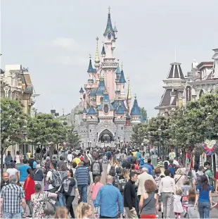  ?? Picture: AP. ?? Left: The Angus Youth Orchestra is made up of talented musicians aged 11-18. Above: Disneyland Paris, where the group will get to play.