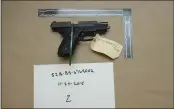  ?? U.S. DISTRICT COURT FOR MASSACHUSE­TTS ?? This evidence photo from a criminal complaint shows one of 10 M11 semiautoma­tic handguns that former Army Reserve member James Morales stole from the Lincoln Stoddard Army Reserve Center in Worcester, Mass.