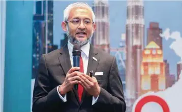  ??  ?? InvestKL chief executive officer Muhammad
Azmi Zulkifli says it is confident that the economy will return to normalcy this year on the back of the government’s Covid-19 vaccinatio­n programme.