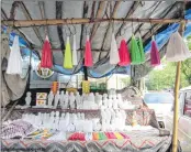  ??  ?? A stall selling religious items during the Bandra Fair.