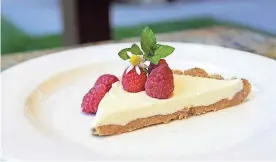  ?? AIMEE BLUME/EVANSVILLE COURIER & PRESS ?? This quick and easy white chocolate cheesecake might be the perfect summer dessert.