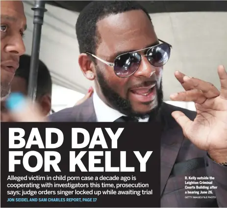  ?? GETTY IMAGES FILE PHOTO ?? R. Kelly outside the Leighton Criminal Courts Building after a hearing June 26.