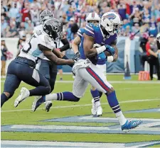  ?? JAMES KENNEY THE ASSOCIATED PRESS FILE PHOTO ?? Veteran receiver Duke Williams, shown here scoring a touchdown for the Buffalo Bills in 2019, has signed with the Ticats as a free agent.