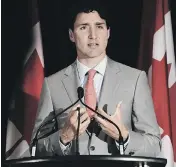  ?? TED PRITCHARD / THE CANADIAN PRESS ?? Prime Minister Justin Trudeau expressed relief that the U. S. will not go ahead with plans for a border tax.