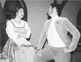  ?? RICHARD HUTTON NIAGARA THIS WEEK ?? Adrianna Polito, as Belle, and Bryn Dewar as Gaston in a scene from Garden City Production­s production of Disney’s Beauty and the Beast, which begins its run at the Mandeville Theatre at Ridley College on Nov. 16.