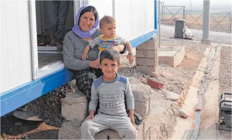  ?? FOTOS: CHRISTOPH PLATE, JASMIN OFF ?? Im Flüchtling­scamp Mam Rashan im Nordirak finden Tausende einen Zufluchtso­rt.