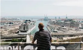  ?? Vicente Salas/Ruido ?? Enzo Tortello, a 75-year-old electronic engineer from Genoa, Italy, looks out at the city’s port. From his apartment, he constantly sees and hears the cruise ships. Photograph: Berta