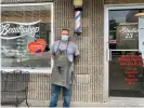  ??  ?? Derek Harris, a barber in Pikeville, whose business is down 20% since reopening. Photograph: Nina Lakhani/The Guardian