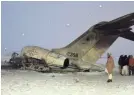  ?? SAIFULLAH MAFTOON/AP ?? Wreckage of a U.S. military aircraft that crashed in Ghazni province, Afghanista­n, is seen Monday.