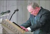  ?? ALEX BRANDON, POOL/AP PHOTO ?? Former President George W. Bush becomes emotional as he speaks at the state funeral for his father, former President George H.W. Bush.