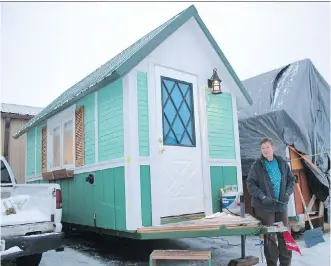  ?? THE ASSOCIATED PRESS/ FILES ?? A local tiny home enthusiast wants to build a community in Wheatland County, east of Calgary, similar to this one in Madison, Wis.