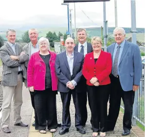  ??  ?? Bridgend politician­s campaignin­g for improved train services on the Maesteg line. Back, from left, are Huw Irranca-Davies MP, Councillor Mal Reeves, Councillor Phil White, and Councillor Mel Nott, Leader of BCBC. Front, from left are Councillor Ceri...
