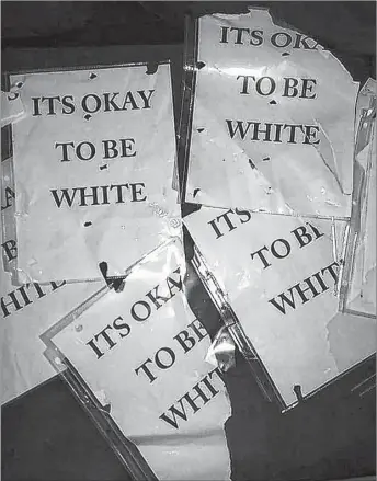  ?? CONTRIBUTE­D ?? Bradley Johnson of New Glasgow said he was walking in Stellarton when he saw someone putting up these signs, which read, “It’s okay to be white,” on Nov. 1.