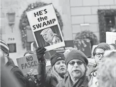  ?? TIMOTHY A. CLARY, AFP/GETTY IMAGES ?? Protesters outside the Trump Tower in New York last month.