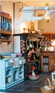  ??  ?? In a corner of the First House kitchen, the coal range, fashioned from kauri, has been painted black. The overhead drying rack holds Lynda’s hand-made laundry
Completed furniture, fittings, and accessorie­s that have yet to find a place in one of the Brocklehur­st dolls’ houses