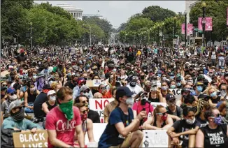  ?? ALEX BRANDON / ASSOCIATED PRESS ?? A huge outpouring of demonstrat­ors protesting police brutality and racial oppression stretches as far as the eye can see in the nation’s capital Saturday.