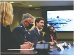  ?? SEAN KILPATRICK/THE CANADIAN PRESS ?? Prime Minister Justin Trudeau, centre, and Minister of National Defence Anita Anand, second right, made a visit to NORAD headquarte­rs in Colorado earlier this month.