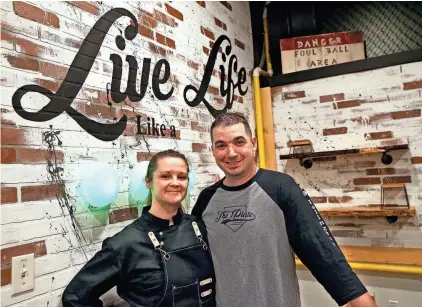  ?? DEB CRAM/PORTSMOUTH HERALD ?? John and Martha Edwards are opening Behind the Plate, a baseball-themed restaurant on Islington Street in Portsmouth with a menu inspired by Major League Baseball cities.