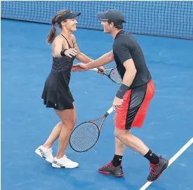  ??  ?? Martina Hingis celebrates with Jamie Murray.