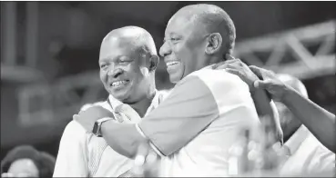  ?? PHOTO: ITUMELENG ENGLISH/AFRICAN NEWS AGENCY (ANA) ?? David Mabuza, new ANC deputy president, and the party’s new president Cyril Ramaphosa celebrate their victories during the elective conference at the Nasrec expo centre in Joburg.