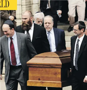  ?? MATT ROURKE / THE ASSOCIATED PRESS ?? A casket is carried out of Rodef Shalom Congregati­on on Tuesday after funeral services for brothers Cecil and David Rosenthal in Pittsburgh, Penn. The brothers were killed in the mass shooting Saturday at the Tree of Life synagogue.
