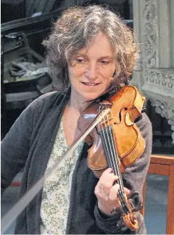  ?? Picture: SWNS ?? Krysia Osostowicz, 57, playing her beloved 18th-century violin