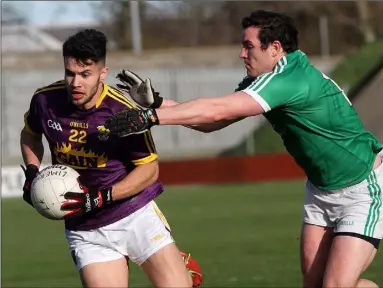  ??  ?? Paul Curtis, a late replacemen­t for the injured Ben Brosnan, taking on the Limerick defence.