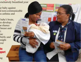  ??  ?? Health staff assist mothers of newborns to breastfeed successful­ly.