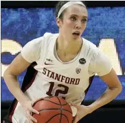  ?? MORRY GASH — THE ASSOCIATED PRESS ?? Stanford’s Lexie Hull passes during her team’s NCAA Tournament semifinal over South Carolina on Friday.