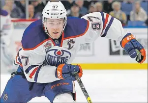  ?? CP PHOTO ?? Edmonton Oilers forward Connor McDavid skates is likely to win his first Hart Trophy as NHL MVP tonight.