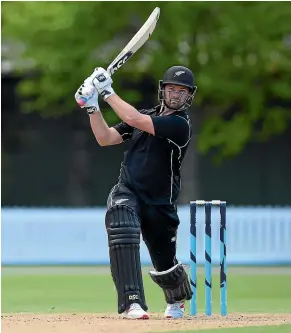  ?? GETTY IMAGES ?? Colin Munor hits out during his unbeaten century for the New Zealand XI against England yesterday.
