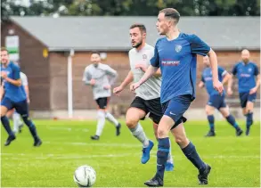  ?? PHOTO: Artur Lesniak ?? Freshford United (blue) were beaten 1-0 at home to table topping Three Daggers in the Trowbridge &amp; District League Division One