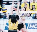  ??  ?? Ateneo’s Maddie Madayag scores off UST’s Kecelyn Galdones during her team’s four-set win in Game 2 of the UAAP Finals Wednesday at the Mall of Asia Arena. (Rio Leonelle Deluvio)