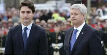  ?? CHRIS WATTIE/REUTERS FILE PHOTO ?? Justin Trudeau and Stephen Harper looked more like comrades-in-arms than recent rivals at Thursday’s memorial ceremony for two Canadian soldiers shot dead in Ottawa and Quebec last year.