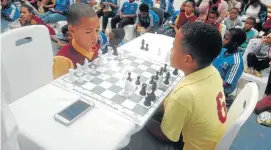 ?? Picture: SUPPLIED ?? YOUNG GENIUSES: Tyler Botha, left, and Cedric Botha in the final of the Sheldon Marillier chess tournament hosted by the Buffalo City Sports Academy on Saturday.