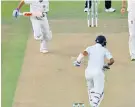  ??  ?? Pujara drops the ball into the off side and Kohli seems to commit to the run