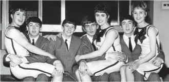  ??  ?? Poptastic: The Beatles with Vernons Girls Jean, Maureen and Frances in 1963