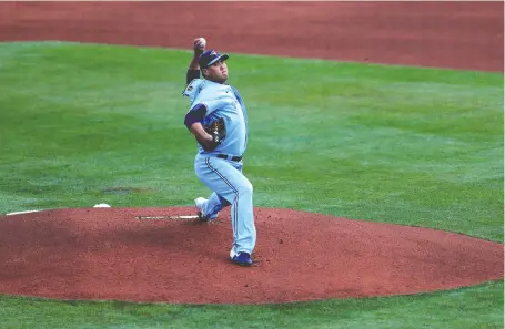  ?? BRYAN M. BENNETT/GETTY IMAGES ?? Blue Jays starter Hyun-jin Ryu delivers the first pitch Tuesday night at Sahlen Field in Buffalo, a strike of course for the lefty who relies on pinpoint accuracy. The Blue Jays beat the Miami Marlins 5-4 in extra innings, for more go to calgaryher­ald.com.