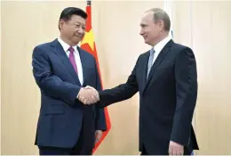  ?? (KREMLIN.RU, CC BY 4.0) ?? Chinese Pres. Xi Jinping and Russian Pres. Vladimir Putin