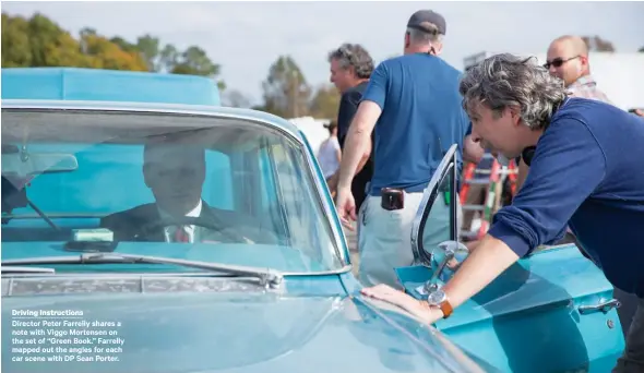  ??  ?? Driving Instructio­nsDirector Peter Farrelly shares a note with Viggo Mortensen on the set of “Green Book.” Farrelly mapped out the angles for each car scene with DP Sean Porter.