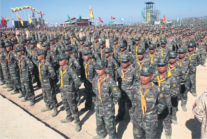  ??  ?? TAKING A STAND: Hundreds of Shan State soldiers take part in a parade to celebrate the 70th Shan State National Day at Loi Tai Leng, a town and army base along the Myanmar-Thailand border.