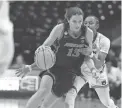  ?? GETTY IMAGES ?? Arizona’s Helena Pueyo drives to the rim against Auburn during the First Four game of the NCAA Women’s Tournament on Thursday in Storrs, Conn.