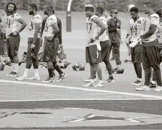  ?? Tony Gutierrez / Associated Press ?? Lest they forget where they are, the Texans have the Cowboys’ logo to remind them after Tropical Storm Harvey forced the team to relocate to the Cowboys’ training facility in Frisco in preparatio­n for Thursday’s preseason finale, which was moved to...