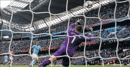  ?? Picture: REUTERS ?? GOAL GLORY: Manchester City’s Gabriel Jesus scores their fourth goal during their Premier League match against Stoke City at the Etihad Stadium in Manchester on Saturday. City won 7-2