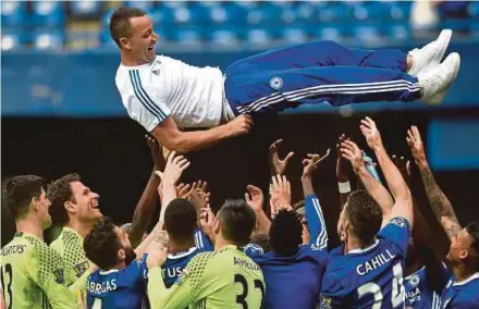  ??  ?? Chelsea captain John Terry (top), who will leave Stamford Bridge at the end of the season, will lift the English Premier League trophy today.