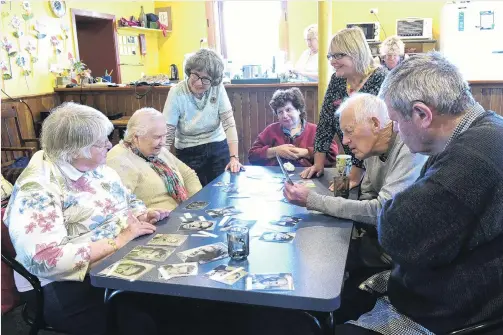  ?? PHOTOS: LINDA ROBERTSON ?? Mix and match . . . Playing a memory game at the SeniorLink activity centre are Daisy Madden, Karin Madsen, coordinato­r Geraldine Tait, Rosemary Cory, activity coordinato­r Gaynor Propsting, Andrew Smith and Ross James, while volunteers make tea in the background.