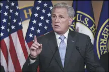  ?? J. SCOTT APPLEWHITE /AP ?? House Minority Leader Kevin McCarthy, R-Calif., many of his House colleagues and state lawmakers around the country continue to stand behind President Donald Trump. “Impeaching the president with just 12 days left in his term will only divide our country more,” he said Friday.